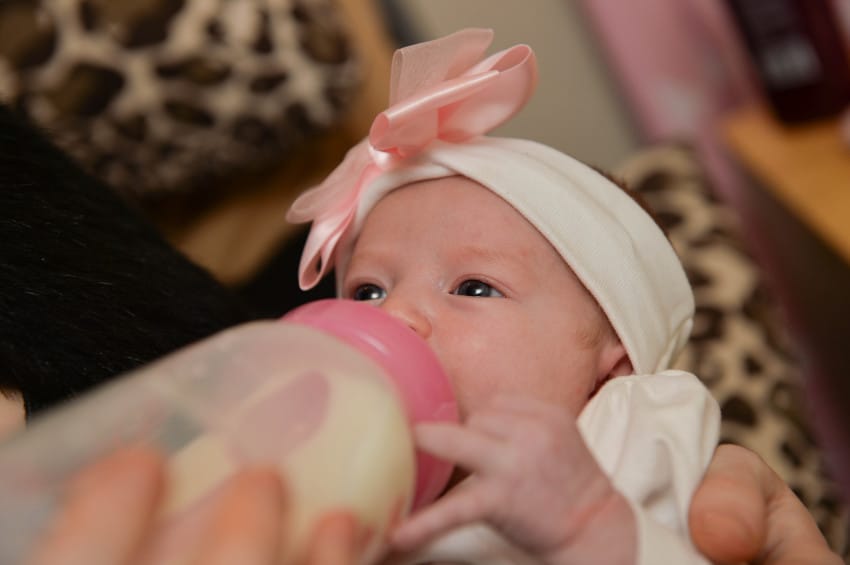 Go Ask Mum bottle feeding baby with teeth Go Ask Mum